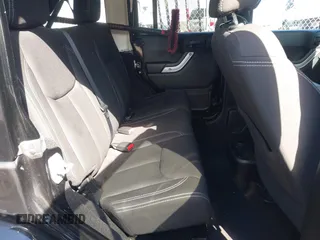 2015 Jeep Wrangler Unlimited Sahara with VIN 1C4BJWEGXFL506361, listed as a IAAI auction lot 41865418 with 80,841 mi miles. Bid and sale history available at carsss.com. Image 8.