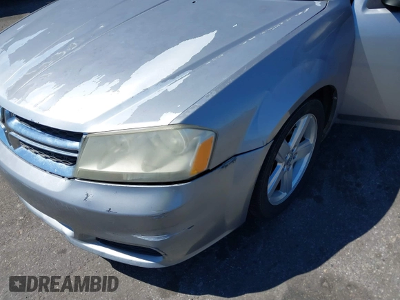 2013 Dodge Avenger with VIN 1C3CDZAB4DN661517, listed as a IAAI auction lot 41886529 with 141,596 mi miles and . Bid and sale history available at DreamBid. Image 6.