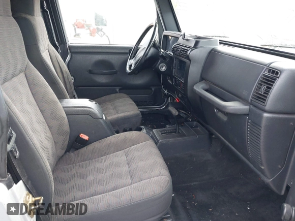 2005 Jeep Wrangler Unlimited with VIN 1J4FA44S25P340852, listed as a IAAI auction lot 41441671 with 139,302 mi miles. Bid and sale history available at carsss.com. Image 5.