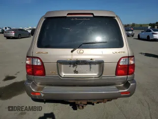 2001 Lexus LX 470 z VIN JTJHT00W213507042, wystawiony jako Copart lot #52634195 z przebiegiem 179 707 mil mil oraz Tytuł czysty. Historia ofert i sprzedaży dostępna na DreamBid. Obrazek 6.