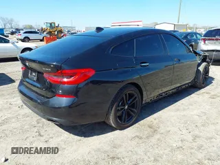 2018 BMW 6 Series 640i xDrive with VIN WBAJV6C5XJBK07708, listed as a IAAI auction lot 41784298 with 70,000 mi miles and . Bid and sale history available at carsss.com. Image 4.
