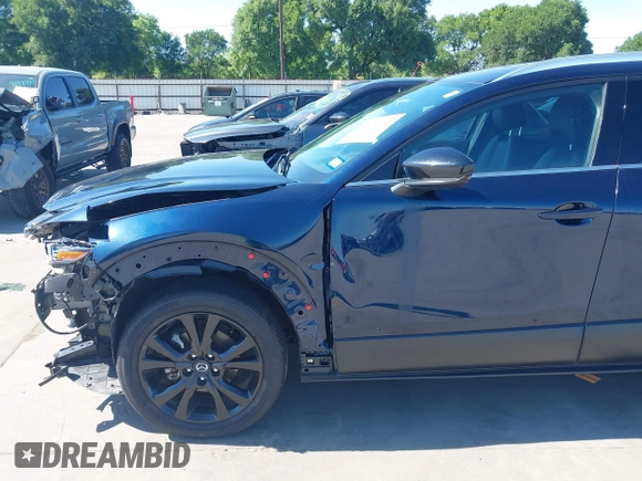 2021 Mazda CX-30 Premium with VIN 3MVDMBDYXMM307047, listed as a IAAI auction lot 41974966 with 53,409 mi miles and . Bid and sale history available at carsss.com. Image 19.