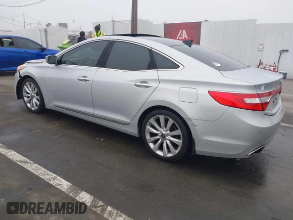 2014 Hyundai Azera Limited with VIN KMHFH4JG7EA388931, listed as a IAAI auction lot 41468407 with 130,597 mi miles and . Bid and sale history available at DreamBid. Image 3.