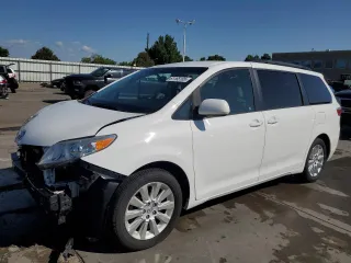2015 Toyota Sienna LE with VIN 5TDJK3DC2FS126466, listed as a Copart auction lot 61165105 with 56,634 mi miles and Salvage title. Bid and sale history available at DreamBid. Image 1.