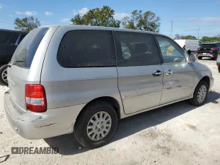 2003 Kia Sedona LX with VIN KNDUP131236453481, listed as a Copart auction lot 75660244 with 125,628 mi miles and Salvage Title. Bid and sale history available at carsss.com. Image 3.