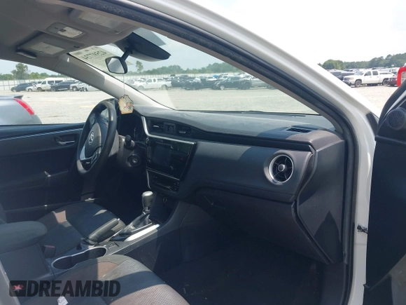 2018 Toyota Corolla L with VIN 2T1BURHE3JC988786, listed as a IAAI auction lot 42597734 with 88,016 mi miles and . Bid and sale history available at DreamBid. Image 5.