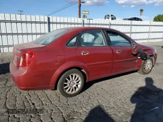 2005 Suzuki Forenza Premium z VIN KL5JJ56Z65K093127, wystawiony jako Copart lot #87691665 z przebiegiem 178 868 mil mil oraz Szkody całkowita. Historia ofert i sprzedaży dostępna na DreamBid. Obrazek 3.