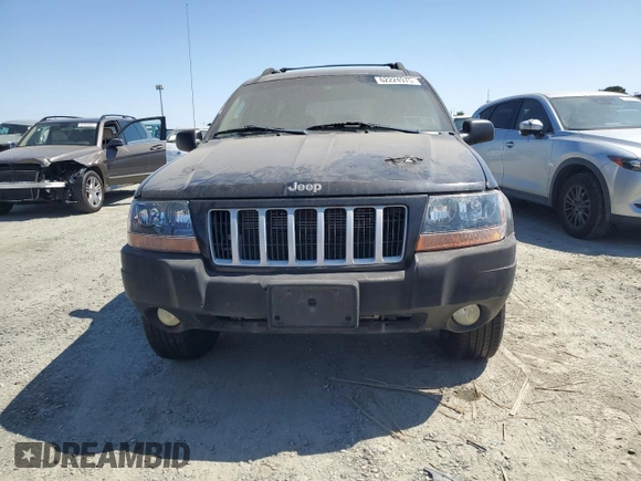 2004 Jeep Grand Cherokee Laredo with VIN 1J4GW48S84C182135, listed as a Copart auction lot 62224975 with 187,938 mi miles and Clean title. Bid and sale history available at DreamBid. Image 5.
