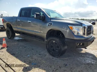 2017 Nissan Titan XD S with VIN 1N6AA1F31HN550814, listed as a Copart auction lot 74151354 with 81,857 mi miles and Salvage Title. Bid and sale history available at carsss.com. Image 4.