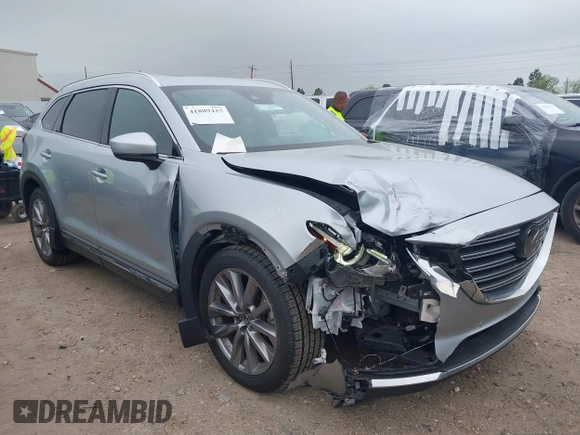2023 Mazda CX-9 Carbon Edition with VIN JM3TCBDY7P0638506, listed as a IAAI auction lot 41889425 with 60,471 mi miles and . Bid and sale history available at carsss.com. Image 1.