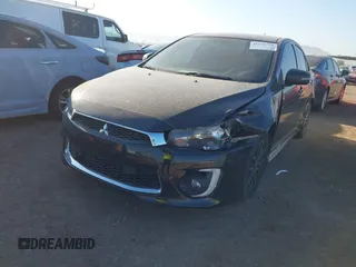 2017 Mitsubishi Lancer ES with VIN JA32U2FU3HU005652, listed as a IAAI auction lot 41478764 with 104,816 mi miles. Bid and sale history available at carsss.com. Image 2.