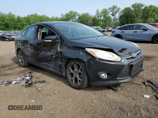 2013 Ford Focus SE with VIN 1FADP3F21DL280156, listed as a Copart auction lot 59814185 with 103,252 mi miles and Salvage title. Bid and sale history available at DreamBid. Image 4.