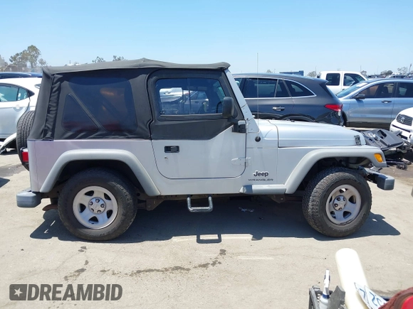 2004 Jeep Wrangler SE with VIN 1J4FA29134P715165, listed as a IAAI auction lot 42297821 with 109,397 mi miles and . Bid and sale history available at DreamBid. Image 14.