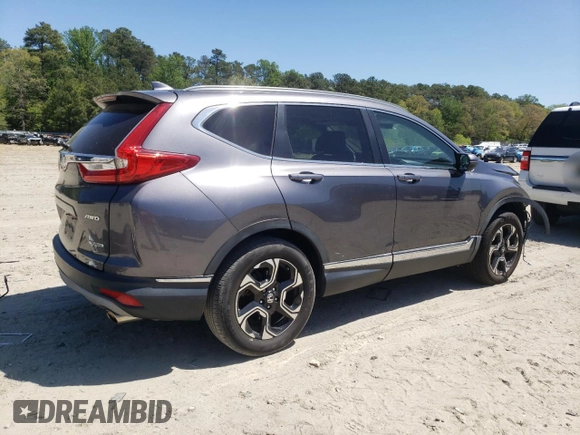 2017 Honda CR-V Touring with VIN 2HKRW2H96HH612495, listed as a Copart auction lot 54195655 with 66,968 mi miles and Salvage Title. Bid and sale history available at DreamBid. Image 3.