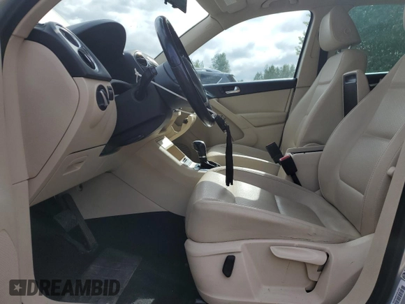 2011 Volkswagen Tiguan SE with VIN WVGBV7AX8BW539668, listed as a Copart auction lot 56858575 with 107,079 mi miles and Clean Title. Bid and sale history available at DreamBid. Image 7.