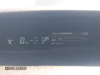 2015 Toyota Prius Four with VIN JTDKN3DU6F1883985, listed as a IAAI auction lot 42072673 with 129,117 mi miles and . Bid and sale history available at DreamBid. Image 7.