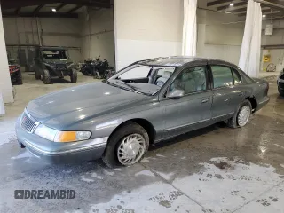 1997 Lincoln Continental with VIN 1LNLM97VXVY624609, listed as a Copart auction lot 73921634 with 119,746 mi miles and Salvage Title. Bid and sale history available at carsss.com. Image 1.