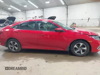 2020 Honda Civic LX with VIN 2HGFC2F6XLH551000, listed as a IAAI auction lot 42279270 with 76,134 mi miles and . Bid and sale history available at DreamBid. Image 13.