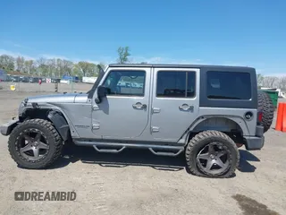 2015 Jeep Wrangler Unlimited Sport z VIN 1C4BJWDG6FL768265, wystawiony jako IAAI lot #42150124 z przebiegiem 85 108 mil mil oraz . Historia ofert i sprzedaży dostępna na DreamBid. Obrazek 14.