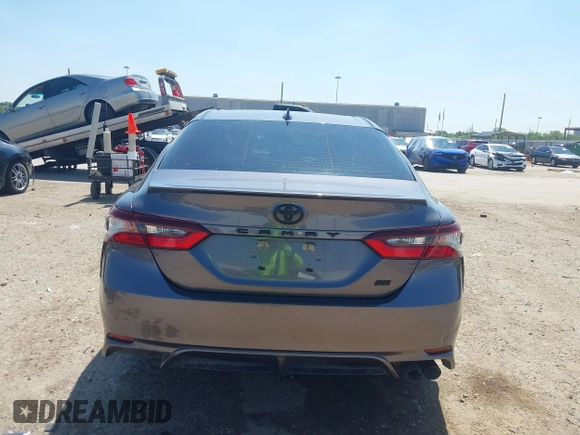 2023 Toyota Camry SE z VIN 4T1G11AK3PU735202, wystawiony jako IAAI lot #41874542 z przebiegiem 54 708 mil mil oraz . Historia ofert i sprzedaży dostępna na DreamBid. Obrazek 17.