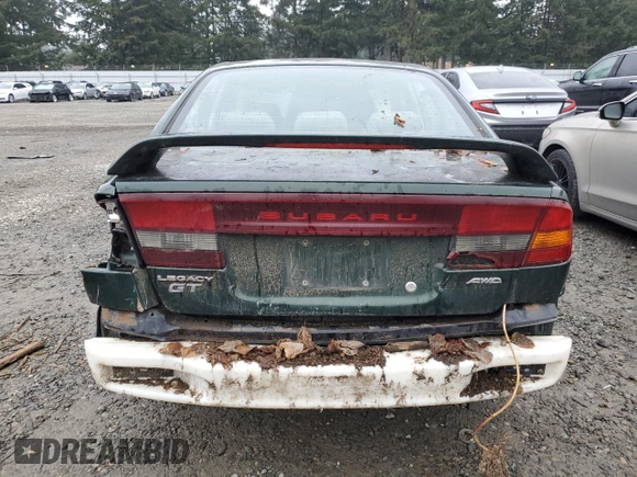 2000 Subaru Legacy with VIN 4S3BE6453Y7215569, listed as a Copart auction lot 81493564 with 218,045 mi miles and Salvage title. Bid and sale history available at DreamBid. Image 6.