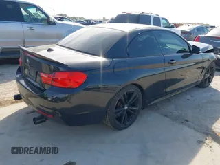 2014 BMW 4 Series 435i with VIN WBA3T3C59EP737612, listed as a IAAI auction lot 42260394 with 104,877 mi miles and . Bid and sale history available at DreamBid. Image 4.
