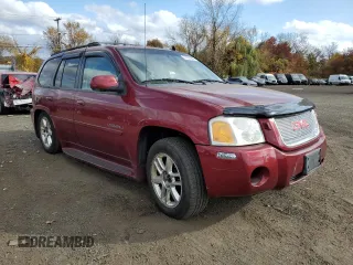2007 GMC Envoy Denali with VIN 1GKET63M472231291, listed as a Copart auction lot 77020984 with 157,364 mi miles and Salvage Title. Bid and sale history available at DreamBid. Image 4.