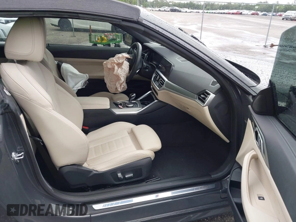 2023 BMW 4 Series 430i with VIN WBA23AT03PCL21070, listed as a IAAI auction lot 42730718 with 19,859 mi miles and . Bid and sale history available at DreamBid. Image 5.