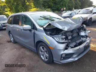 2018 Honda Odyssey EX-L with VIN 5FNRL6H74JB085382, listed as a IAAI auction lot 40238916 with 47,296 mi miles. Bid and sale history available at carsss.com. Image 1.