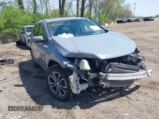 2020 Honda CR-V EX with VIN 7FARW1H59LE017725, listed as a IAAI auction lot 42093575 with 105,000 mi miles and . Bid and sale history available at DreamBid. Image 1.