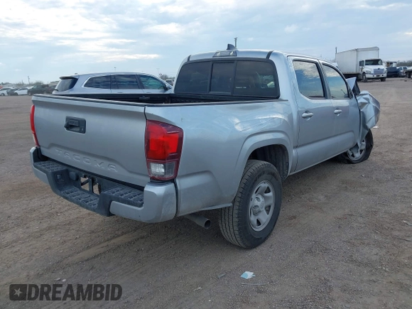 2022 Toyota Tacoma SR with VIN 3TYAX5GN8NT060017, listed as a IAAI auction lot 41504710 with 55,317 mi miles and . Bid and sale history available at DreamBid. Image 4.