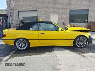 1997 BMW 3-Series 328IC with VIN WBABK8323VET99797, listed as a IAAI auction lot 41616423 with 177,621 mi miles. Bid and sale history available at carsss.com. Image 14.