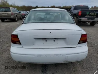 2002 Saturn SL z VIN 1G8ZH52842Z303274, wystawiony jako Copart lot #55164235 z przebiegiem 123 177 mil mil oraz Tytuł czysty. Historia ofert i sprzedaży dostępna na DreamBid. Obrazek 6.
