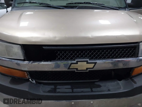 2012 Chevrolet Express Passenger 1LT z VIN 1GAZG1FAXC1127760, wystawiony jako IAAI lot #41629882 z przebiegiem 311 110 mil mil oraz . Historia ofert i sprzedaży dostępna na DreamBid. Obrazek 17.