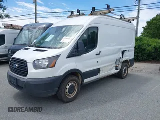 2019 Ford Transit z VIN 1FTYR1CM7KKB27266, wystawiony jako IAAI lot #42290305 z przebiegiem 129 746 mil mil oraz . Historia ofert i sprzedaży dostępna na DreamBid. Obrazek 2.
