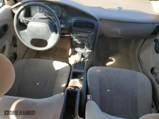 2002 Saturn SL with VIN 1G8ZK527X2Z196501, listed as a Copart auction lot 76672714 with 69,103 mi miles and Salvage Title. Bid and sale history available at carsss.com. Image 8.