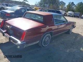 1984 Cadillac Eldorado z VIN 1G6AL5789EE608519, wystawiony jako IAAI lot #41577924 z przebiegiem 12 416 mil mil oraz . Historia ofert i sprzedaży dostępna na DreamBid. Obrazek 4.