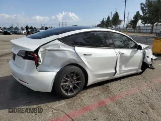 2023 Tesla Model 3 with VIN 5YJ3E1EA5PF486726, listed as a Copart auction lot 51659655 with 14,632 mi miles and Salvage title. Bid and sale history available at DreamBid. Image 3.