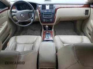2006 Cadillac DTS 1SC z VIN 1G6KD57Y26U182388, wystawiony jako Copart lot #71929184 z przebiegiem 91 711 mil mil oraz Szkoda całkowita • Salvage title. Historia ofert i sprzedaży dostępna na DreamBid. Obrazek 8.