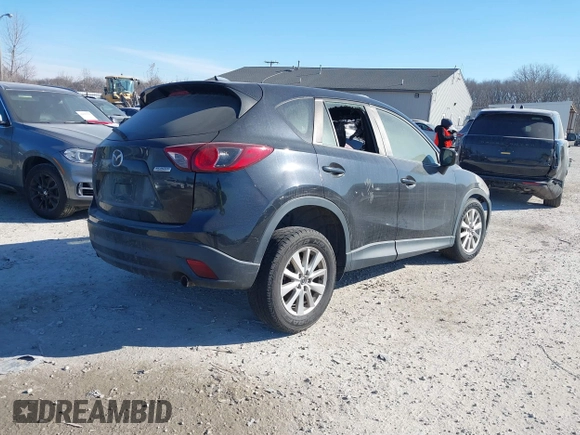2015 Mazda CX-5 Sport z VIN JM3KE2BEXF0473564, wystawiony jako IAAI lot #41408107 z przebiegiem Nie podano mil oraz . Historia ofert i sprzedaży dostępna na DreamBid. Obrazek 4.