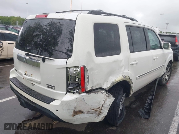 2013 Honda Pilot Touring with VIN 5FNYF4H96DB016044, listed as a IAAI auction lot 42314590 with 183,913 mi miles and . Bid and sale history available at DreamBid. Image 4.