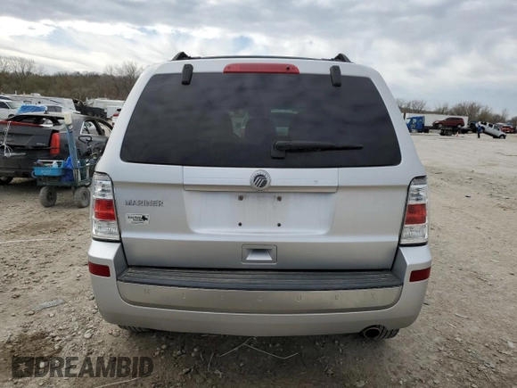 2011 Mercury Mariner z VIN 4M2CN8B73BKJ06886, wystawiony jako Copart lot #50308485 z przebiegiem 118 584 mil mil oraz Szkoda całkowita • Salvage title. Historia ofert i sprzedaży dostępna na DreamBid. Obrazek 6.