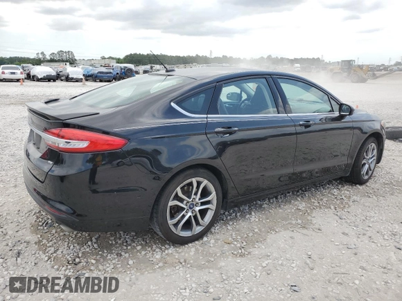 2017 Ford Fusion SE z VIN 3FA6P0H75HR228505, wystawiony jako Copart lot #53251205 z przebiegiem 144 898 mil mil oraz Czysty tytuł • Clean title. Historia ofert i sprzedaży dostępna na DreamBid. Obrazek 3.