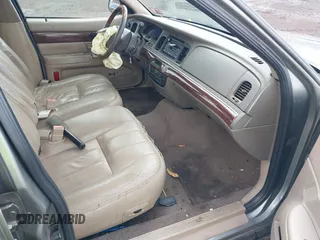 2003 Mercury Grand Marquis LS Premium with VIN 2MEFM75WX3X634344, listed as a IAAI auction lot 41888397 with 129,651 mi miles and . Bid and sale history available at DreamBid. Image 5.