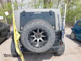 2007 Jeep Wrangler Unlimited X with VIN 1J4GA39147L101084, listed as a IAAI auction lot 41988628 with 194,562 mi miles and . Bid and sale history available at DreamBid. Image 16.