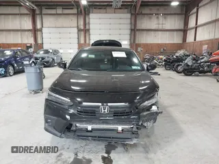 2023 Honda Civic Sport with VIN 2HGFE2F52PH505538, listed as a IAAI auction lot 42447559 with 36,621 mi miles and . Bid and sale history available at DreamBid. Image 12.