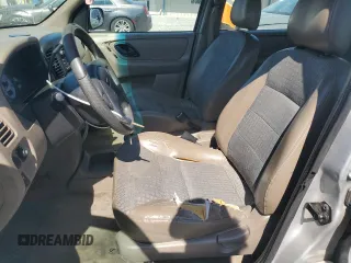 2002 Ford Escape XLS Choice with VIN 1FMYU02112KB00947, listed as a Copart auction lot 48948855 with 223,287 mi miles and Salvage title. Bid and sale history available at DreamBid. Image 7.