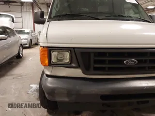 2006 Ford Econoline Cargo with VIN 1FTNE24W56DA13331, listed as a IAAI auction lot 41822424 with 370,496 mi miles and . Bid and sale history available at DreamBid. Image 6.