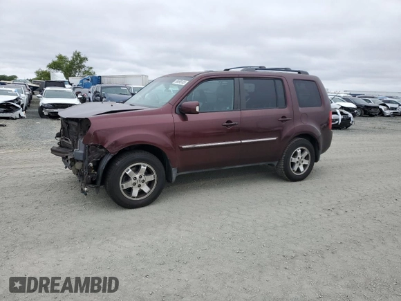 2011 Honda Pilot Touring z VIN 5FNYF3H92BB039165, wystawiony jako Copart lot #59596105 z przebiegiem 182 944 mil mil oraz Szkoda całkowita • Salvage title. Historia ofert i sprzedaży dostępna na DreamBid. Obrazek 1.