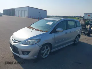 2008 Mazda 5 Grand Touring z VIN JM1CR29L580320258, wystawiony jako IAAI lot #42403256 z przebiegiem 182 914 mil mil oraz . Historia ofert i sprzedaży dostępna na DreamBid. Obrazek 2.